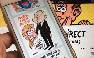 Satirični list Macrona prikazao kao štene koje ujeda Putina