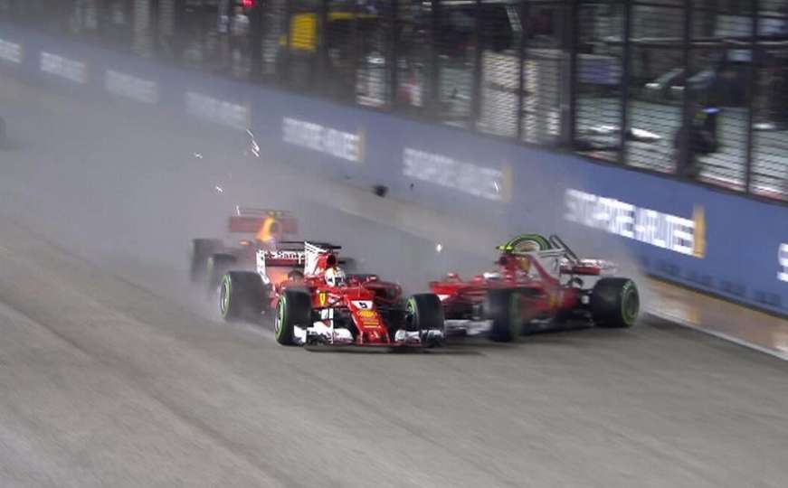 Arrivederci titula: Oba Ferrarija na startu završila VN Singapura