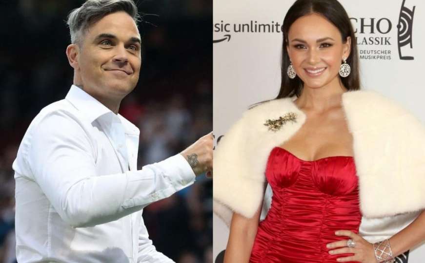 Robbie Williams pjeva na otvorenju SP-a, a u pratnji mu je prelijepa Aida