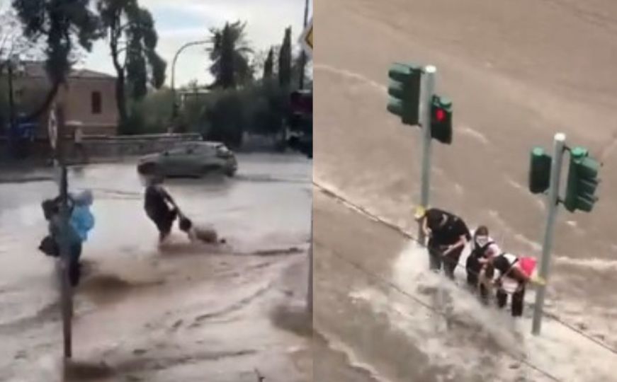 Teku "rijeke" ulicama Atine: Pogledajte potresan video spašavanja žene koju nosi snažna bujica