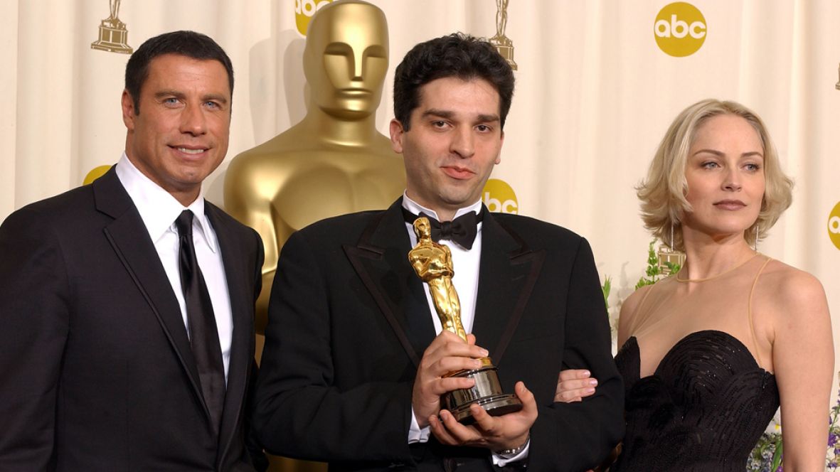 Foto: Variety.com/Danis Tanović, John Travolta i Sharon Stone