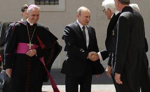 Foto: AA / Putin i papa Franjo