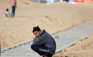 FOTO: AA / Tijela 100 Palestinaca  pokopana u masovnoj grobnici