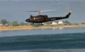 Foto: Press / Helikopter Oružanih snaga BiH u akciji gašenja požara u općini Prozor-Rama